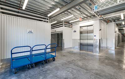 Convenient elevator access for upper level units & moving carts that may be used free of charge.