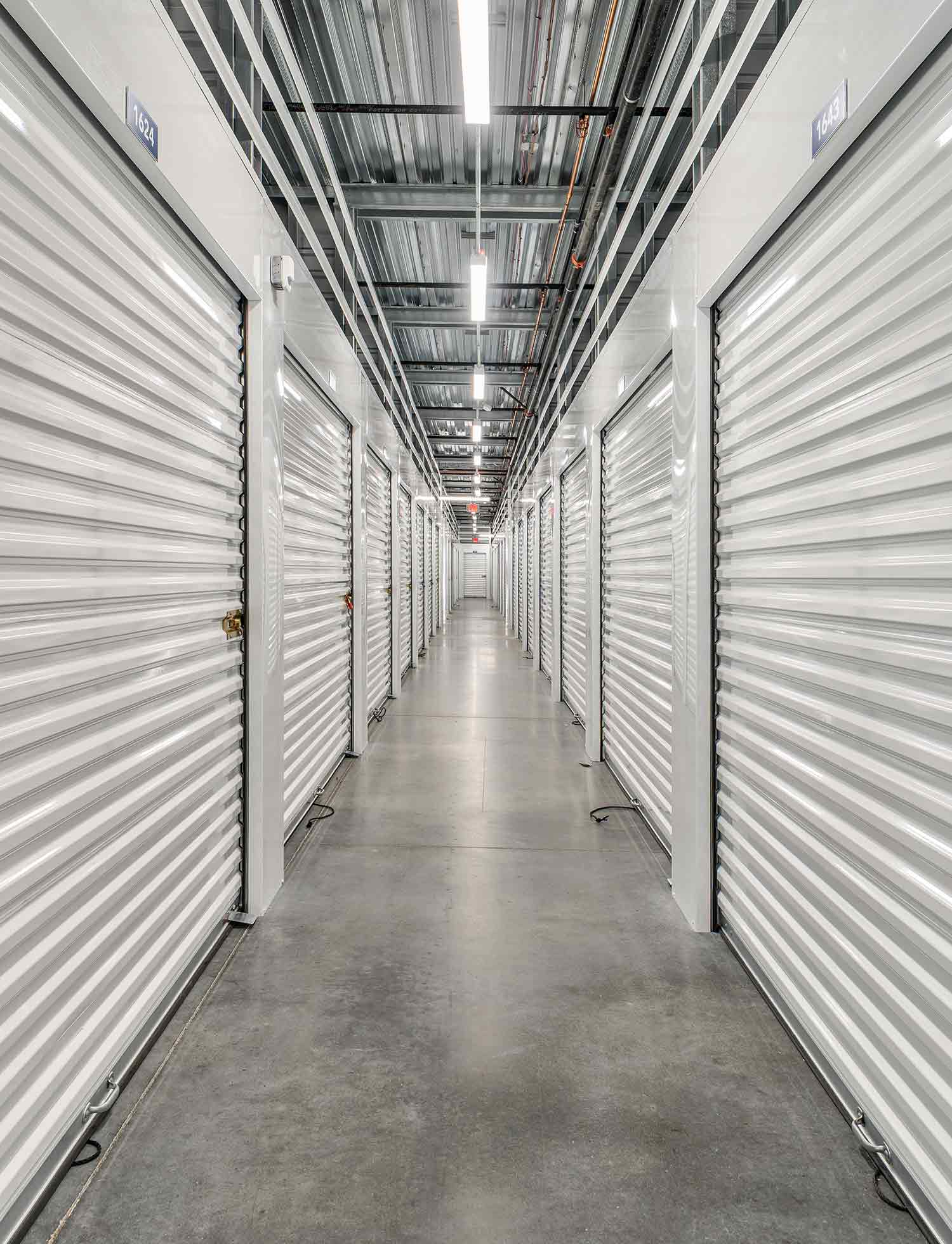 Indoor, clean, bright, and secure storage units.