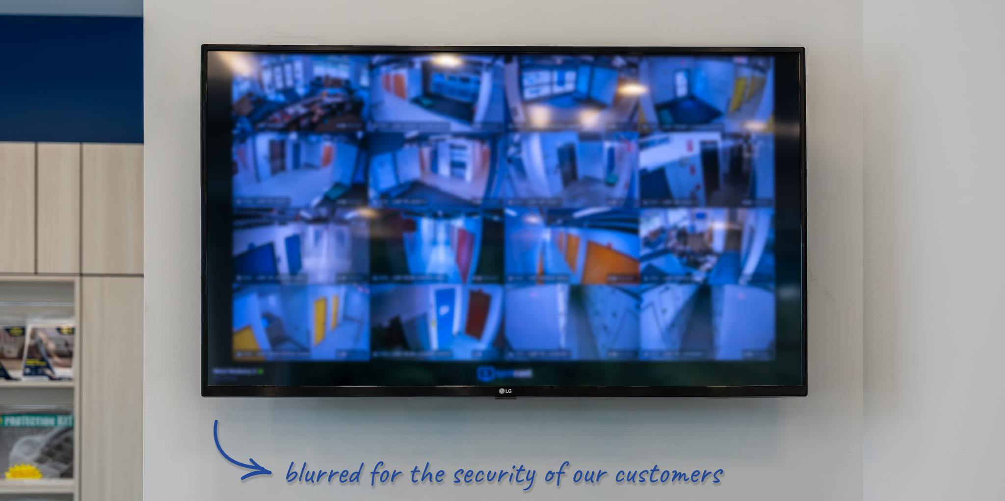 Surveillance monitors displaying facility camera views